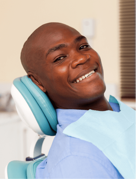 Dental Patient Smiling in Dental Chair